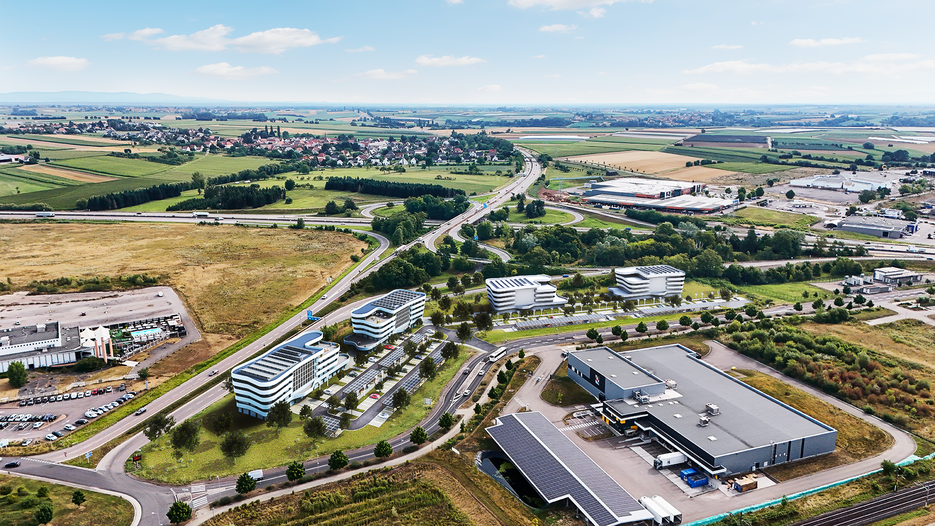 Vue aérienne 3D par drone des futurs bureaux Tribock à Brumath - Ruck & Wind, implantation urbaine Grand Est